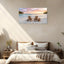 Sunset beach canvas wall art with Adirondack chairs and ocean on bedroom wall