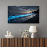 Wall art of a starry night beach scene above a console table with decorative items.