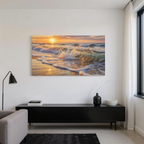 Living room with a large wall art of a sunset over the ocean.