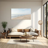 Modern living room with a beach scene painting on the wall