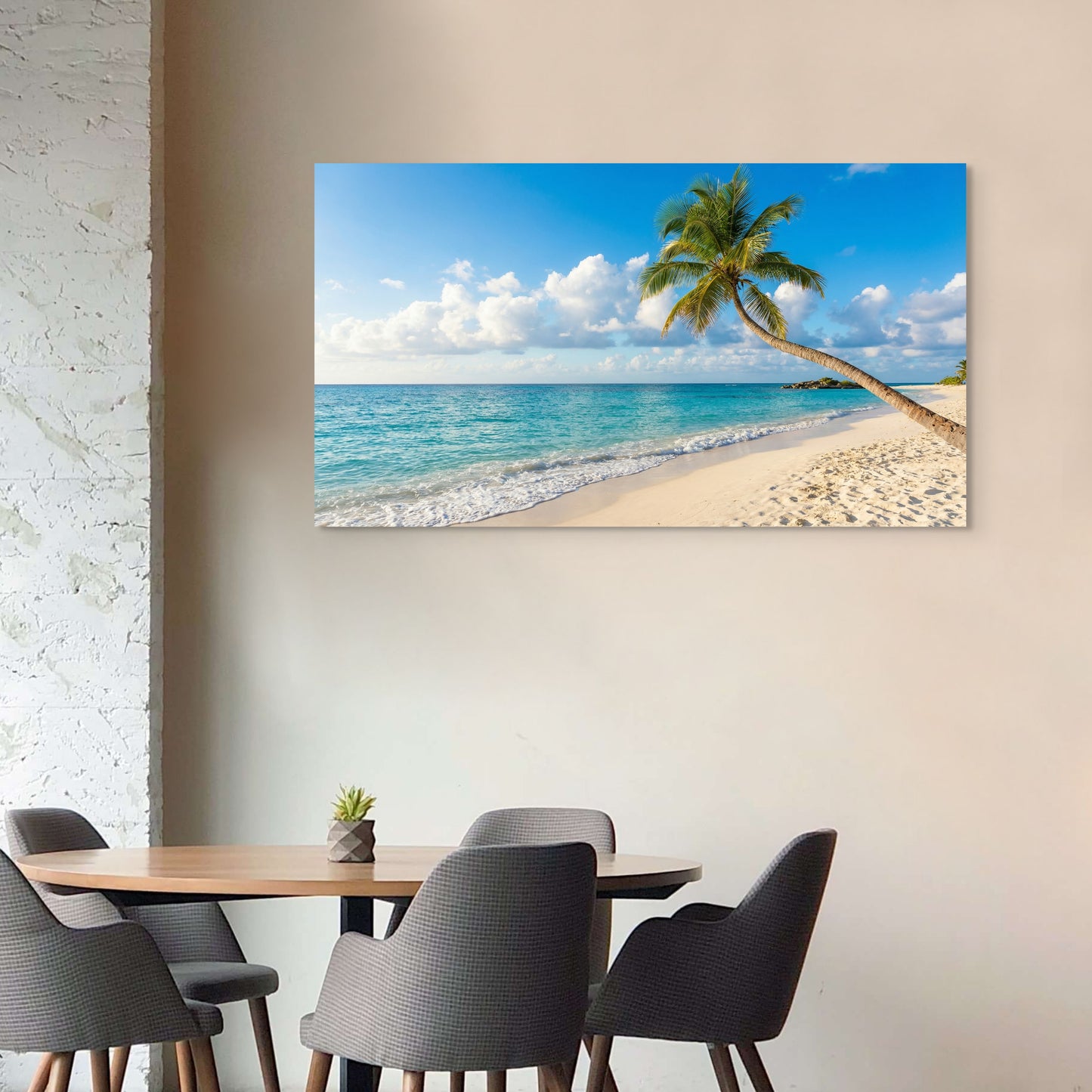 Beach scene with palm tree on wall above dining table and chairs