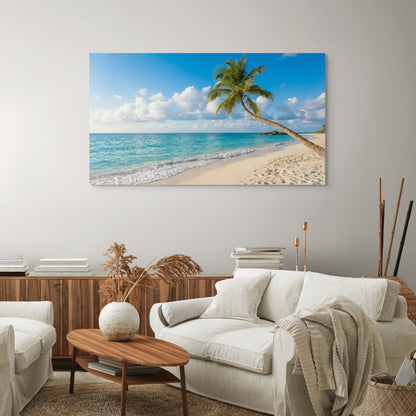 Tropical beach canvas wall art with palm trees and ocean in living room.