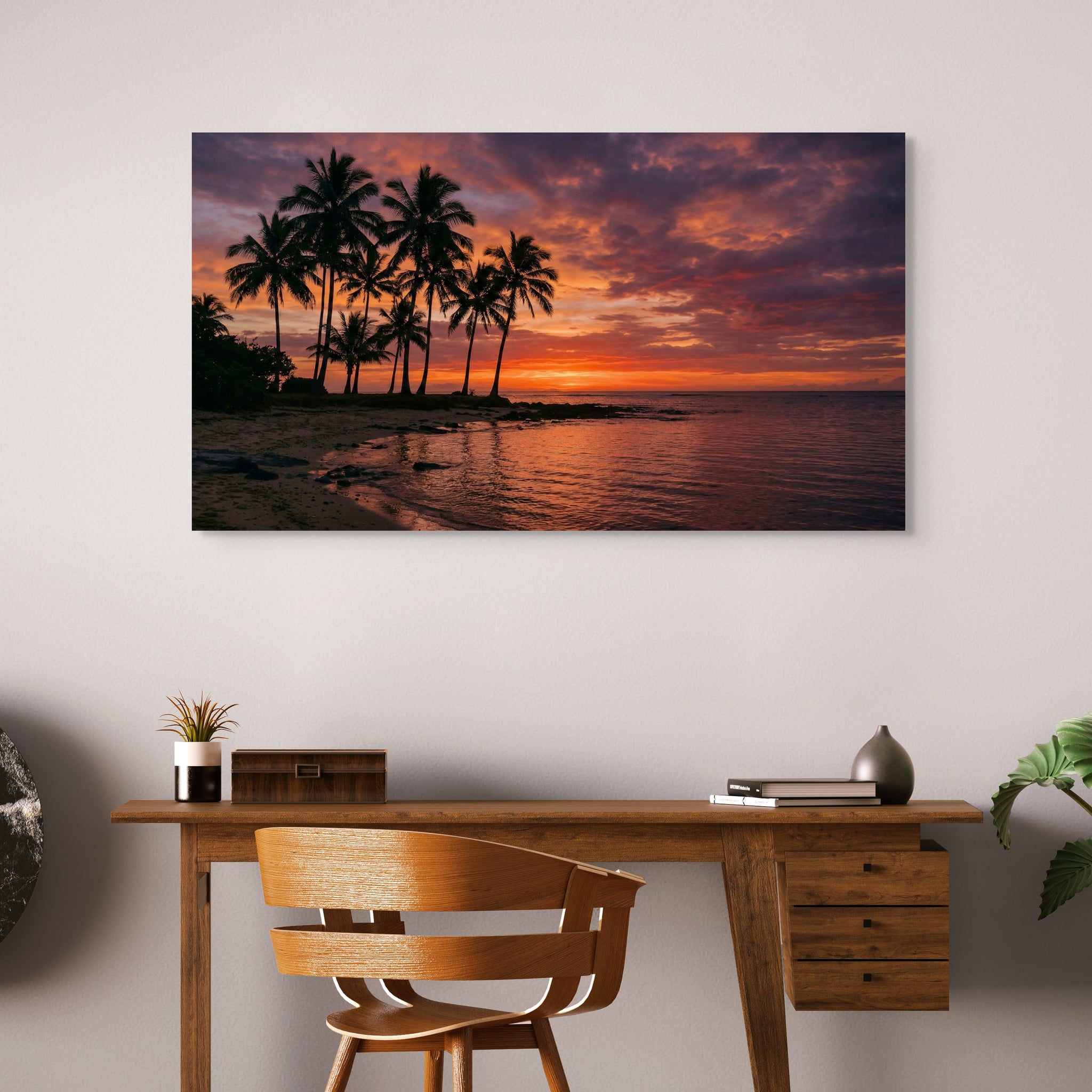 Tropical sunset beach canvas wall art with palm trees in home office.