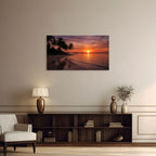 Living room with a sunset over water painting on the wall, a lamp, and a bookshelf.